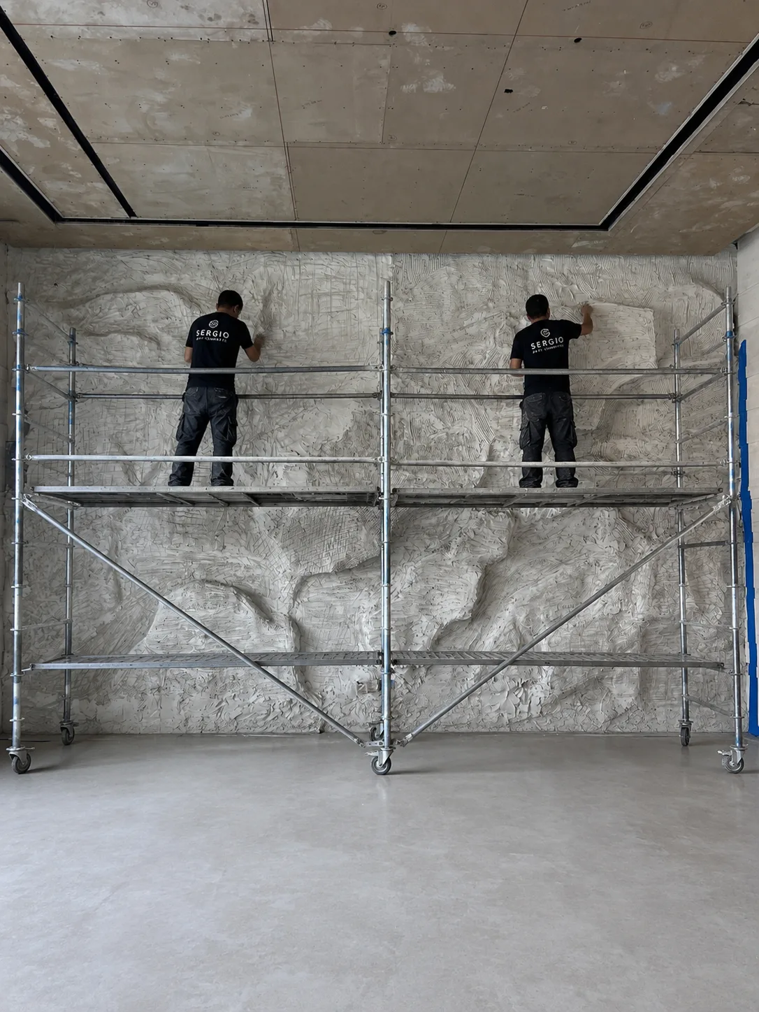 Hand-sculpted art concrete finish with mineral pigment and UV-stable seal — Sergio Decoration UAE